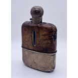 A hallmarked silver hip flask with crocodile skin cover, London 1892