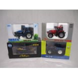 A collection of three boxed die-cast tractors (1:32 scale) including an Imber Models Ford 8970,