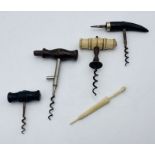 Four antique corkscrews, some A/F