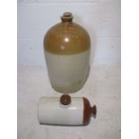 A stoneware cider flagon stamped with Carr & Quick Wine Merchants (Exeter), along stoneware hot