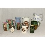 A collection of pottery jugs including a large blue and white Flaxman jug.