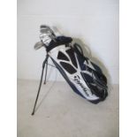 A set of Taylor Made Tour Preferred golf irons including irons 2 to 9, pitching wedge, sand wedge