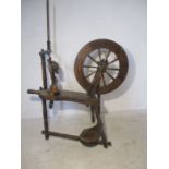 An antique spinning wheel.