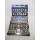 Three boxed Corinthian 12 football player packs including two England squads and a Manchester United