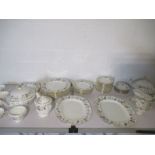 A Minton "Cherrydown" part dinner service including meat platters, teapot, cream jug, dinner plates,