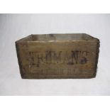 A vintage wooden Trumans beer crate