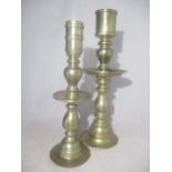 Two large brass Ecclesiastical candlesticks, the tallest measuring 68cm