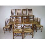A farmhouse refectory style table with ten Ladderback chairs including two carvers.