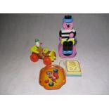 A vintage Fisher Price "Jalopy" pull along toy, along with Fisher Price Music Box Pocket Radio,