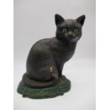 A vintage cast iron door stop in the form of a cat - overall height approx. 31cm