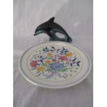 A Poole pottery charger ( diameter 34.75 cm) along with a Poole dolphin