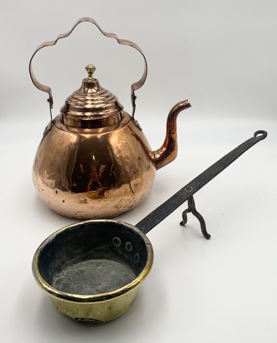 A copper kettle and saucepan