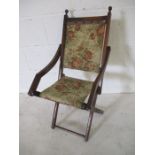 A Victorian folding child's chair with tapestry seat