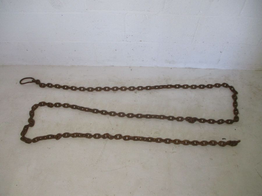 A vintage cast iron link chain