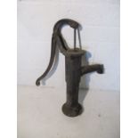 A vintage cast iron water pump