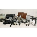 A collection of vintage video cameras including Yashica, Canon, Panasonic, Synchroflex London etc