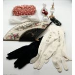 A collection of various items including three scent bottles, two vintage pairs of long gloves, a bag