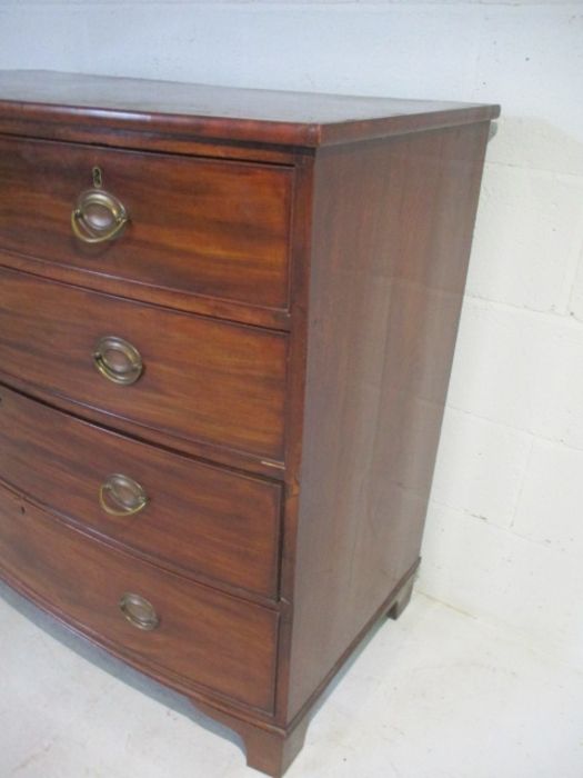 A Georgian mahogany bow fronted chest of drawers. - Image 2 of 10