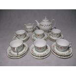A Wedgwood "India Rose" part tea set including teapot, creamer jug & six trios.