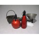 Two vintage red Sparklets Globemaster siphons, along with a set of Avery scales and cast iron