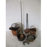 A collection of copper and brass items etc. including copper coal scuttles, hunting horn, jam pan