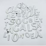 A collection of vintage enamel letters
