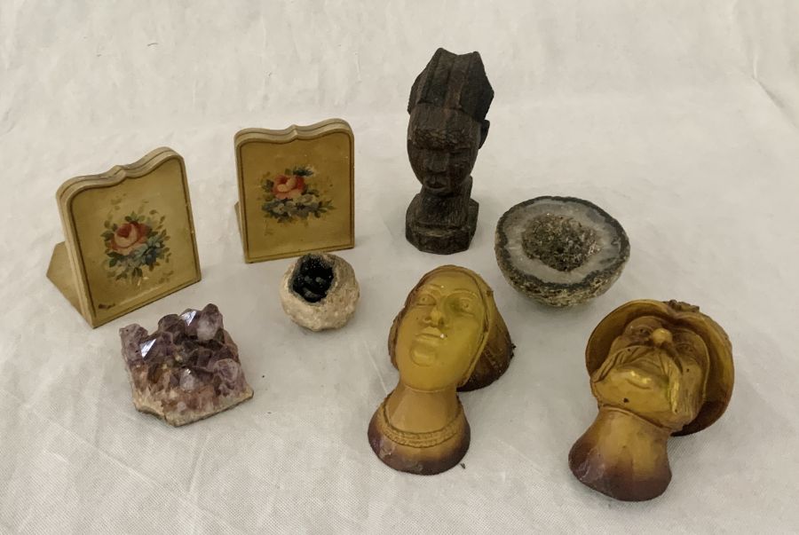 A collection of assorted items including three rock crystals, bookends, carved African head etc