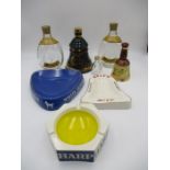 A collection of Breweriana collectables including two Wade Bell's Scotch Whisky bottles, three