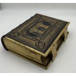 A Victorian, leather, gilt and brass bound Illustrated Family Bible with vacant family register