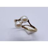 A 9ct gold ring set with pearls