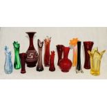 A collection of various art glass vases