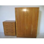 A vintage G-Plan light oak wardrobe by E.Gomme, along with a matching chest of five drawers