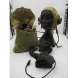 A second world war Aertex fabric flying helmet, marked Harness Airmed England and A.M. plus two