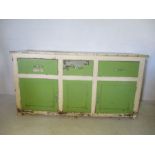 A vintage green and white painted pine dresser base