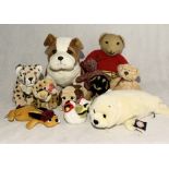 A collection of teddies and soft toys including a Gabrielle Designs tartan bear.