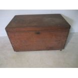 A vintage wooden trunk on castors