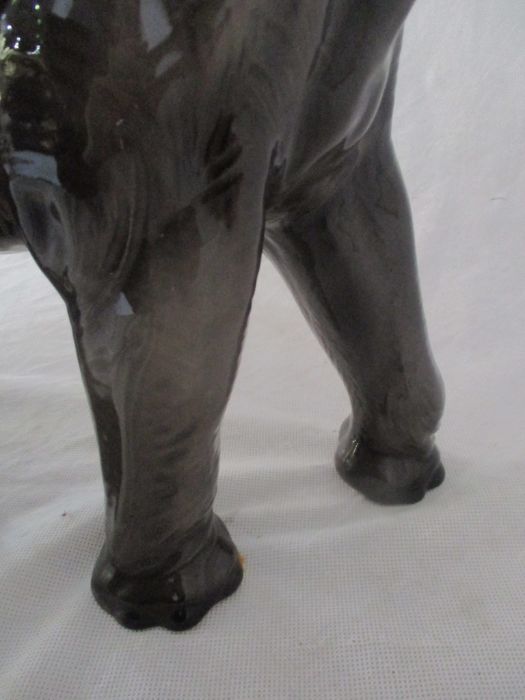 A ceramic elephant. Height 41cm. Has had a repair to one tusk. AF - Image 10 of 15