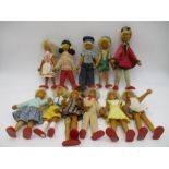 A collection of eleven vintage wooden dolls, made in Poland - one A/F