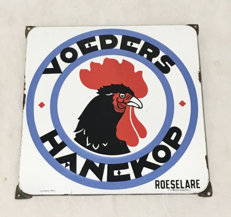 A vintage enamel advertising Dutch advertising sign for a chicken feed supplier