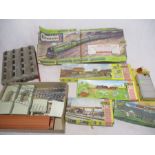 A collection of OO gauge railway plastic model buildings including three boxed Faller structures (