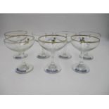 A collection of seven vintage Babycham glasses