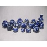 A collection of Chinese blue & white ginger jars and vases, along with a Chinese ginger jar with