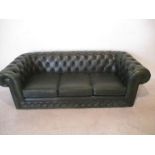 A Thomas Lloyd three seater green Chesterfield button back sofa