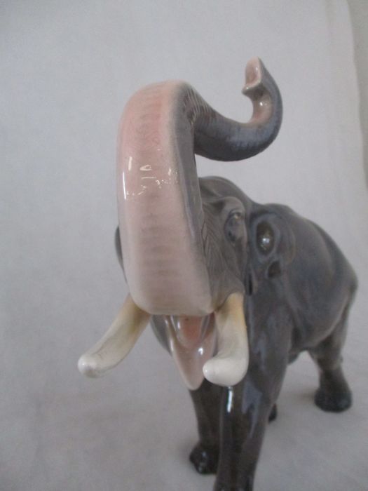A ceramic elephant. Height 41cm. Has had a repair to one tusk. AF - Image 2 of 15