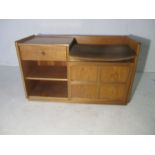 Nathan Furniture - A mid century teak wood telephone seat, a cushioned seat above a panelled door