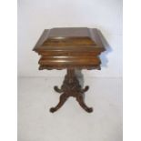 A William IV rosewood veneer teapoy on quatrefoil legs with foliate decoration