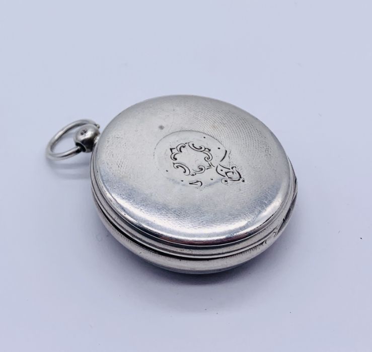 A hallmarked silver pocket watch with fusee movement. The chased silver dial with subsidiary - Image 3 of 4