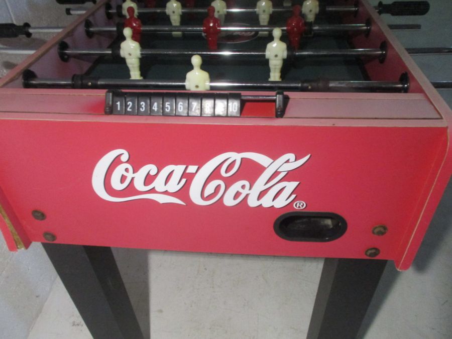 A Coca-Cola branded table football game, including five balls. One side faded by Sun. - Image 5 of 7