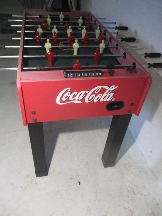 A Coca-Cola branded table football game, including five balls. One side faded by Sun. - Image 3 of 7