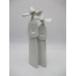 A Lladro figurine of two nuns - numbered 4611 on base, height 33cm